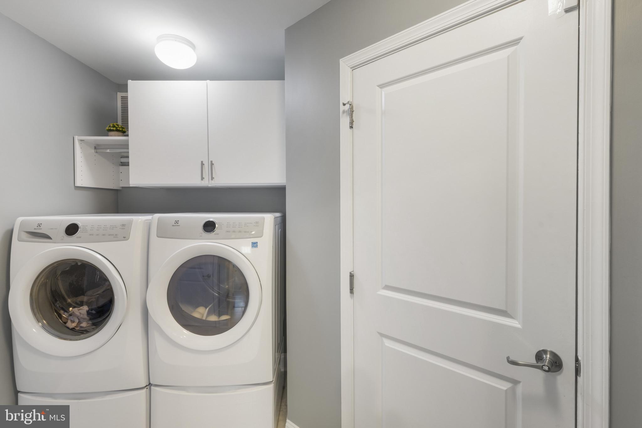 7107 Littlemore Way Hanover, MD 21076 - Photo 8 of 39 a utility room with dryer and washer