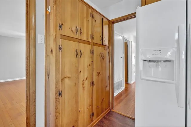 a bathroom with a glass shower door and a glass door