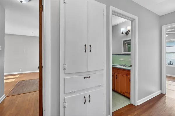 a view of a bathroom from the hallway