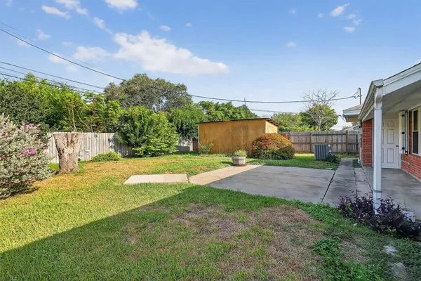 a view of yard with seating space