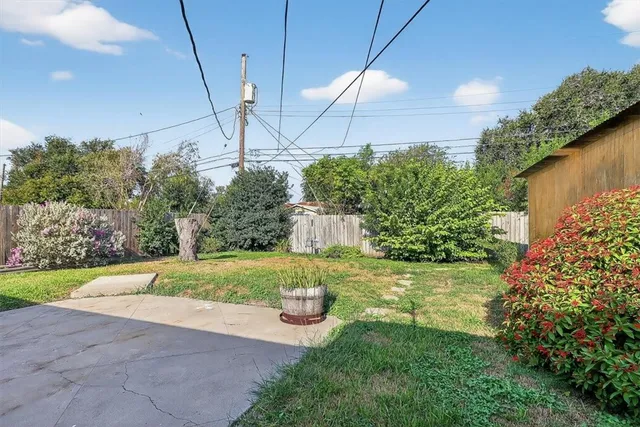 a view of a backyard with garden