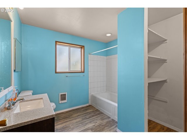 387 East Linden Way Heppner, OR 97836 - Photo 14 of 37 a bathroom with a sink and a mirror