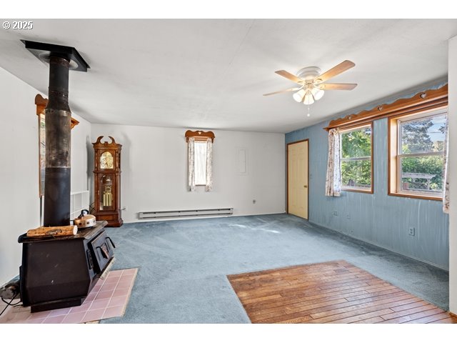 387 East Linden Way Heppner, OR 97836 - Photo 4 of 37 a view of an empty room with a window
