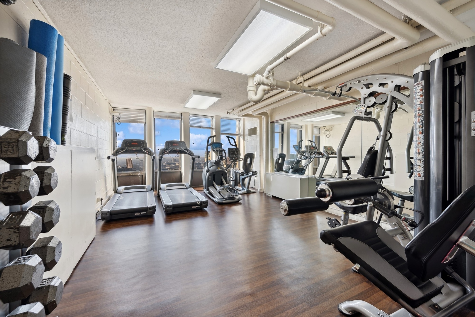 100 East Walton Street, Unit 32FG Chicago, IL 60611 - Photo 28 of 30 a view of a room with gym equipment