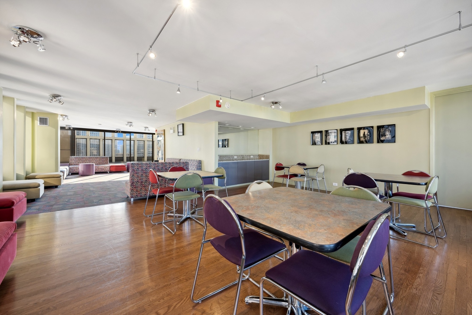 100 East Walton Street, Unit 32FG Chicago, IL 60611 - Photo 29 of 30 a view of a dining room with furniture and wooden floor