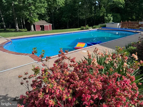 a aerial view of a house with swimming pool