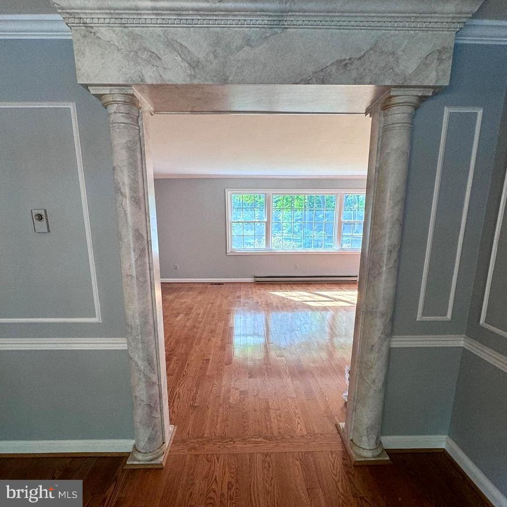 6375 Union Mill Road Clifton, VA 20124 - Photo 15 of 34 a view of empty room with wooden floor and fan