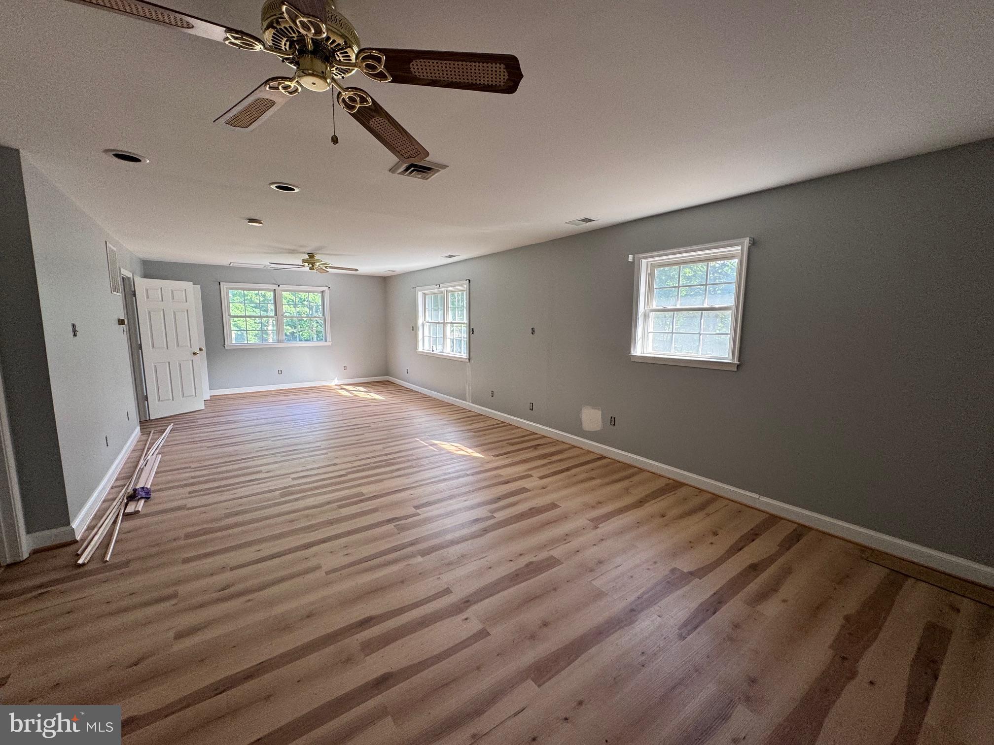 6375 Union Mill Road Clifton, VA 20124 - Photo 31 of 34 a view of an empty room with wooden floor and a window