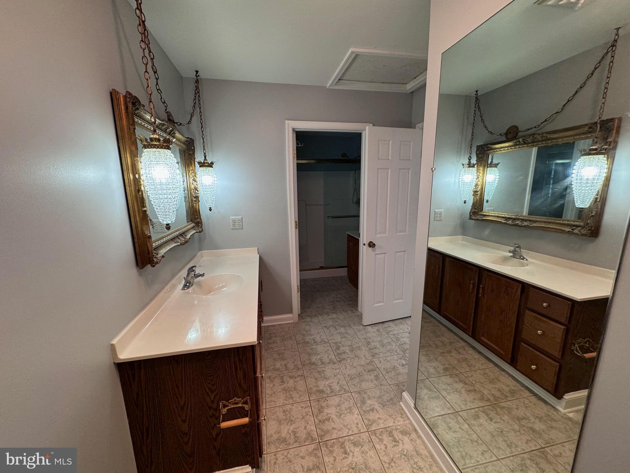 6375 Union Mill Road Clifton, VA 20124 - Photo 32 of 34 a bathroom with a sink and a mirror