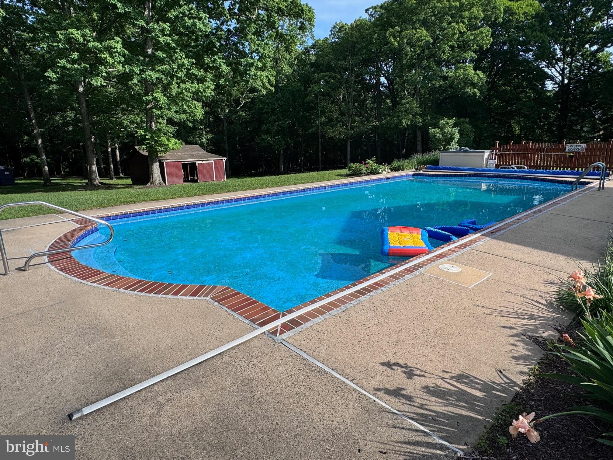 6375 Union Mill Road Clifton, VA 20124 - Photo 7 of 34 a view of a tennis ground with large trees