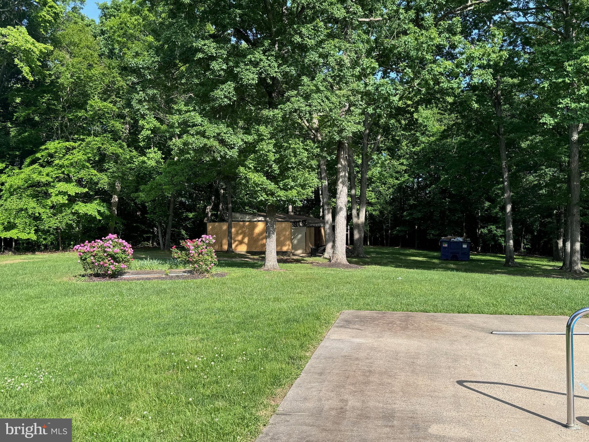 6375 Union Mill Road Clifton, VA 20124 - Photo 8 of 34 a view of a park with a bench and trees