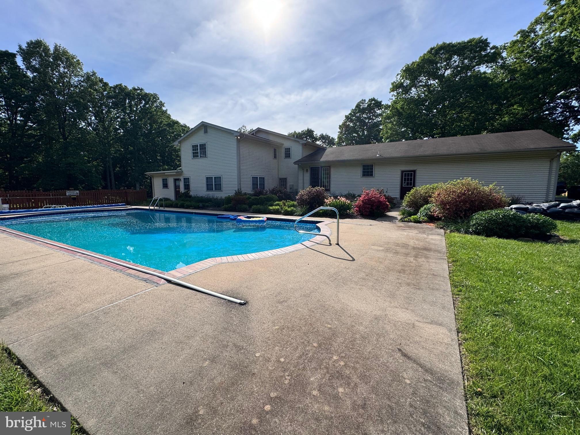 6375 Union Mill Road Clifton, VA 20124 - Photo 10 of 34 a view of a house with backyard and trees
