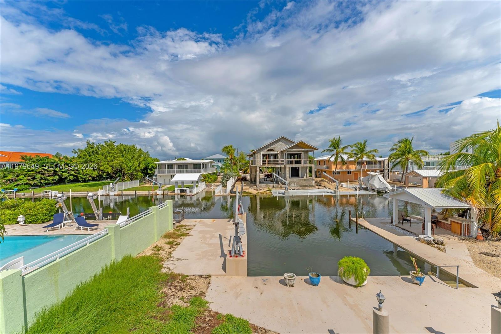 174 Corrine Place, Unit 1 Key Largo, FL 33037 - Photo 17 of 17 a view of swimming pool with outdoor seating