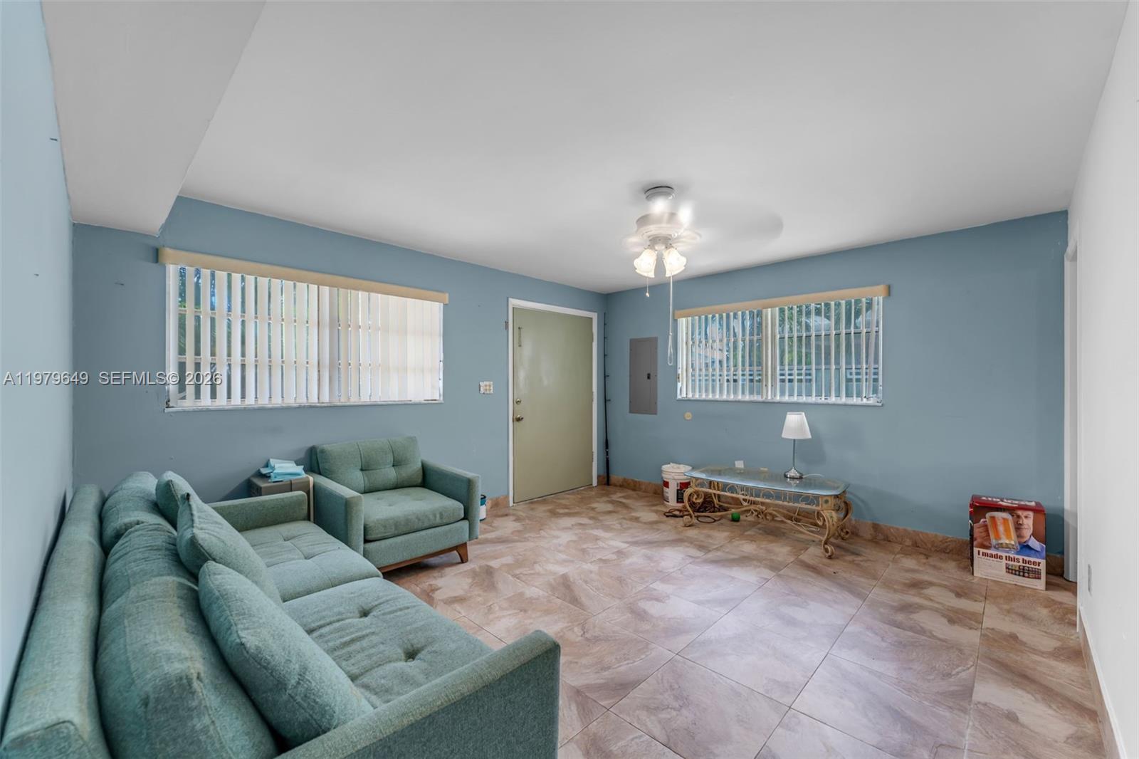 174 Corrine Place, Unit 1 Key Largo, FL 33037 - Photo 4 of 17 a living room with furniture