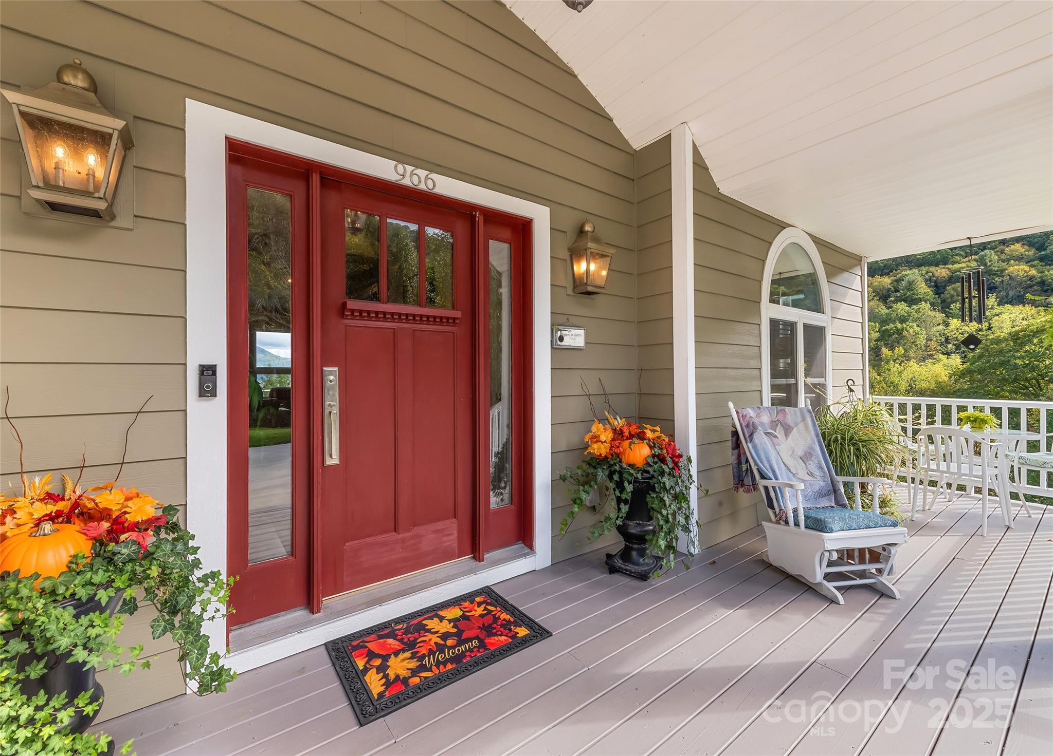 966 Coyote Hollow Road Waynesville, NC 28785 - Photo 4 of 29 a outdoor living space with furniture and a potted plant