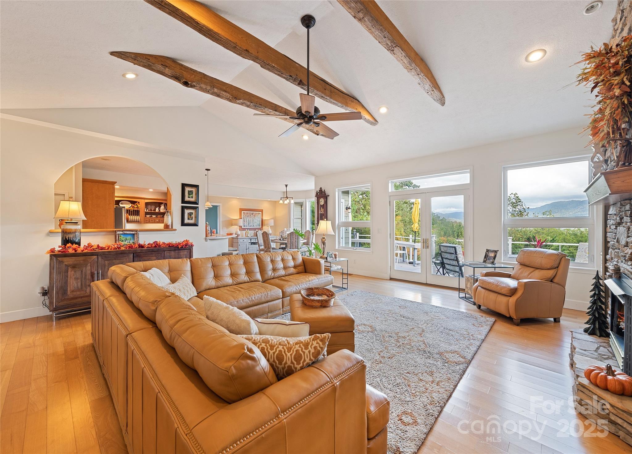 966 Coyote Hollow Road Waynesville, NC 28785 - Photo 8 of 29 a living room with furniture and a large window
