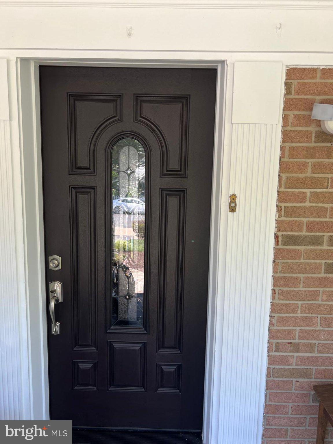 9201 Beachway Lane Springfield, VA 22153 - Photo 4 of 12 Elegant entryway with classic charm.