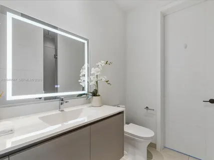a bathroom with a sink and a toilet