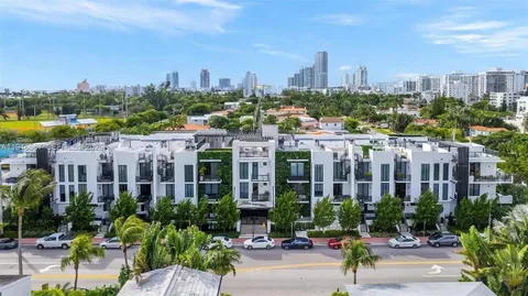 a view of a city with tall buildings