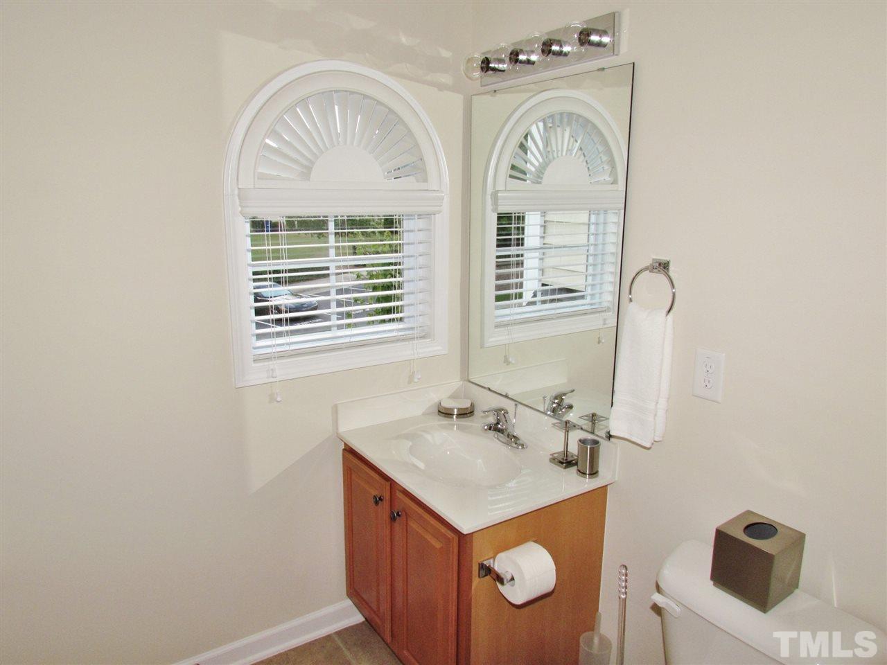 2916 Casona Way Raleigh, NC 27616 - Photo 18 of 25 a view of bathroom with dual sinks