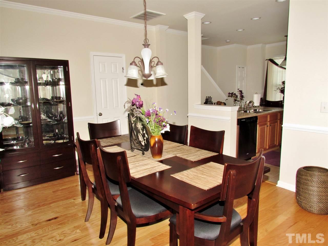 2916 Casona Way Raleigh, NC 27616 - Photo 5 of 25 a view of a dining room with furniture