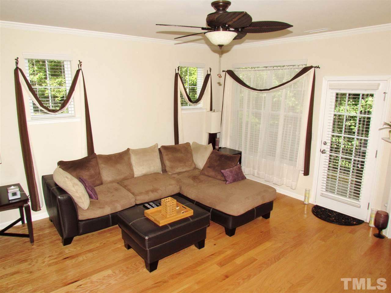 2916 Casona Way Raleigh, NC 27616 - Photo 7 of 25 a living room with furniture and a window