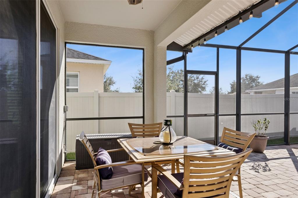 3940 Pine Gate Trail Orlando, FL 32824 - Photo 22 of 36 a view of a dining room with furniture and window