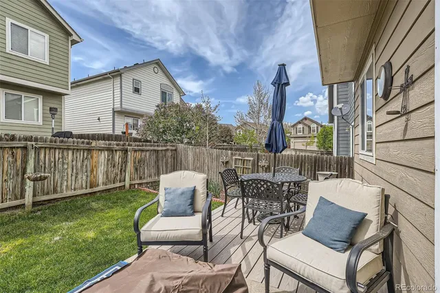 a view of two chairs in the deck
