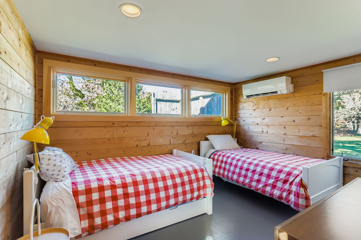 7 Black Point Road Chilmark, MA 02535 - Photo 21 of 48 a bedroom with two beds and a dresser next to a window