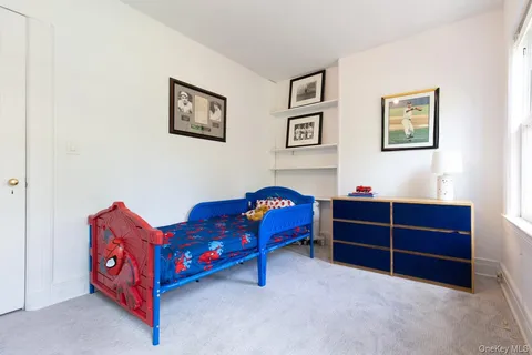 a bedroom with furniture and bed