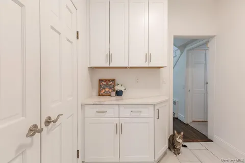 a view of cabinets with wooden floor