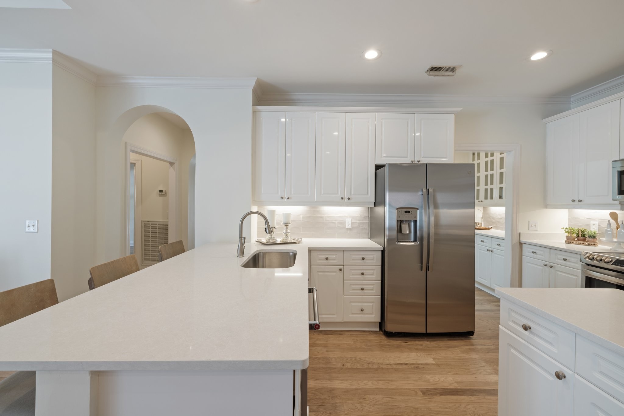 541 Marigold Drive Franklin, TN 37064 - Photo 16 of 69 a kitchen with stainless steel appliances a refrigerator sink and cabinets