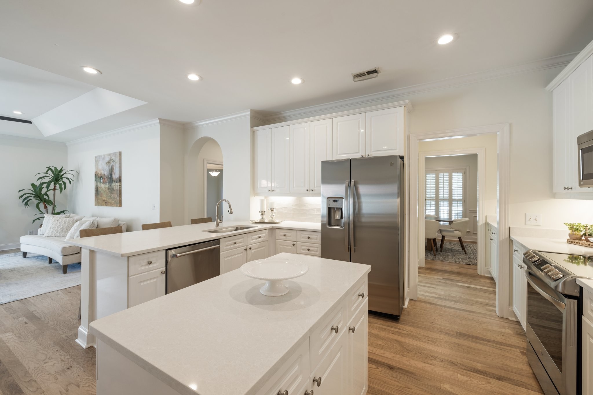 541 Marigold Drive Franklin, TN 37064 - Photo 20 of 69 a kitchen with a sink a counter top stainless steel appliances and cabinets
