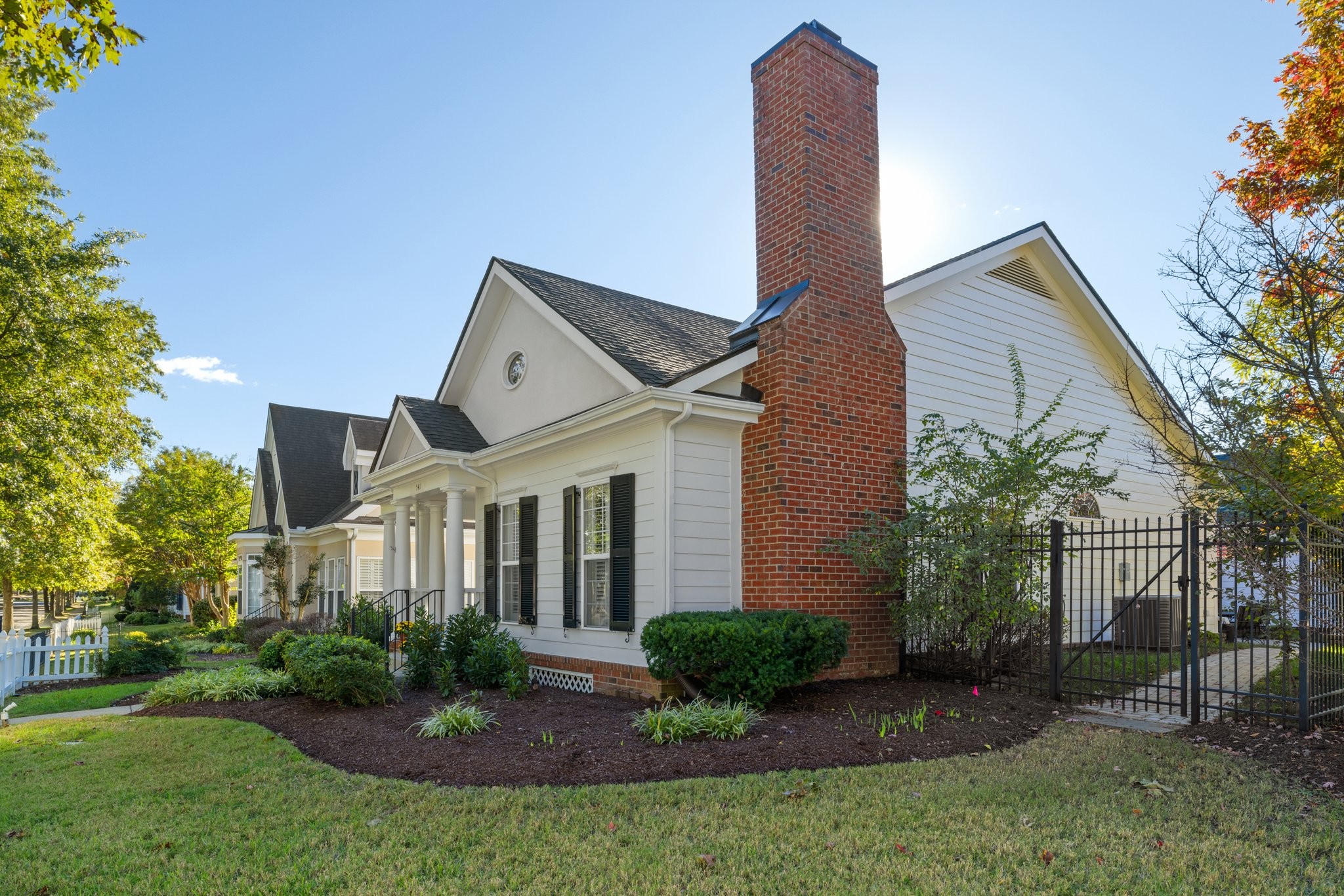 541 Marigold Drive Franklin, TN 37064 - Photo 3 of 69 a front view of house with a garden and plants