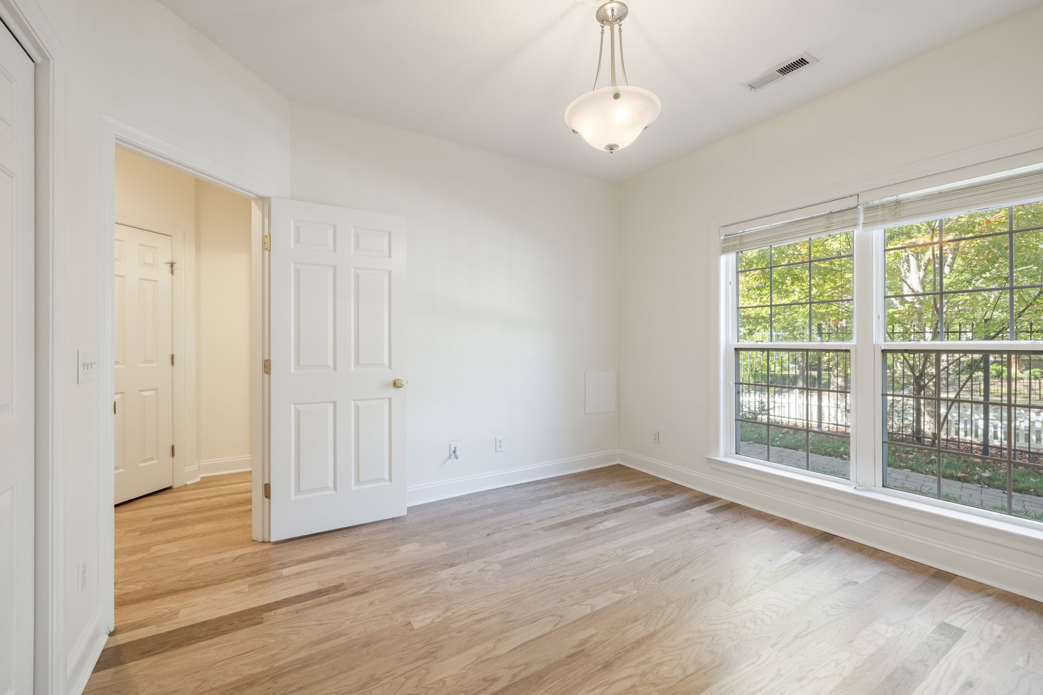 541 Marigold Drive Franklin, TN 37064 - Photo 39 of 69 a view of an empty room with wooden floor and a window