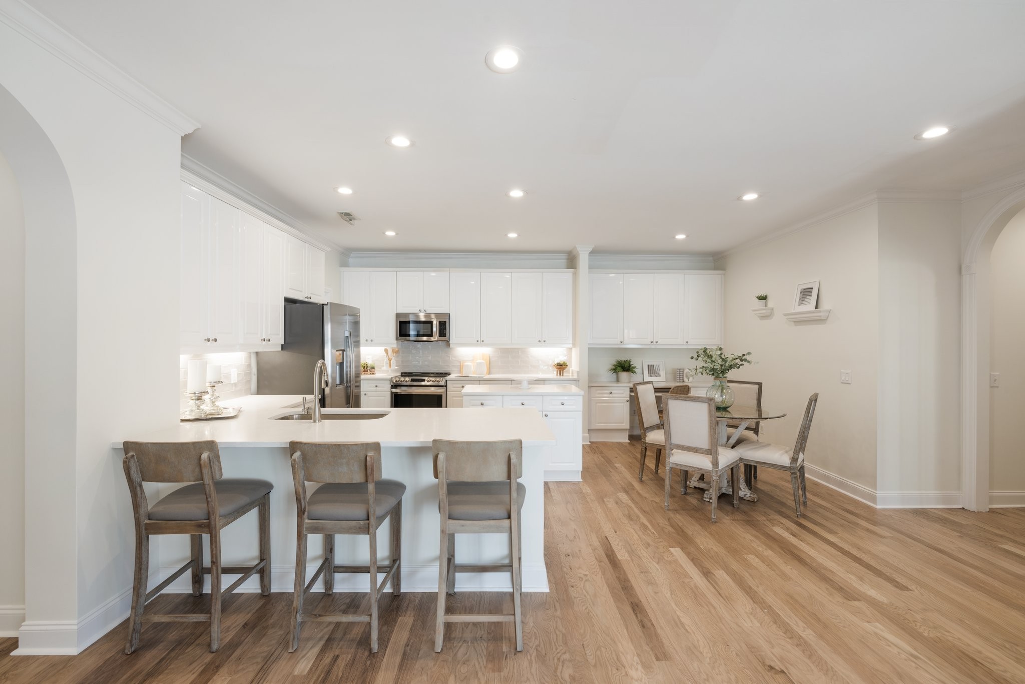 541 Marigold Drive Franklin, TN 37064 - Photo 56 of 69 a view of a dining room with furniture wooden floor and a rug