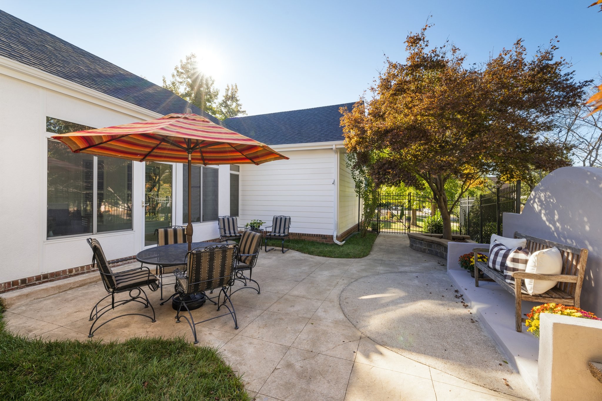 541 Marigold Drive Franklin, TN 37064 - Photo 64 of 69 a view of a patio with table and chairs under an umbrella