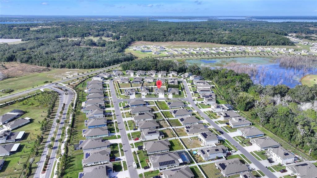 5767 Talc St Mount Mount Dora, FL 32757 - Photo 42 of 44 an aerial view of multiple house