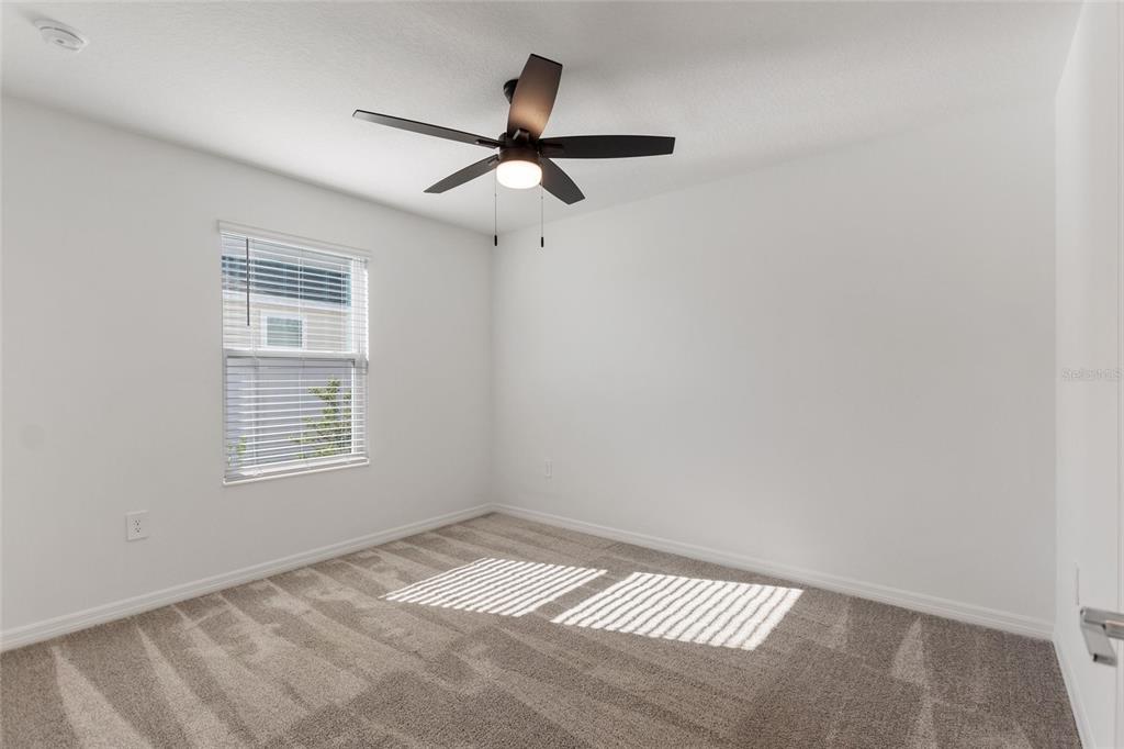 5767 Talc St Mount Mount Dora, FL 32757 - Photo 8 of 44 a view of empty room with windows