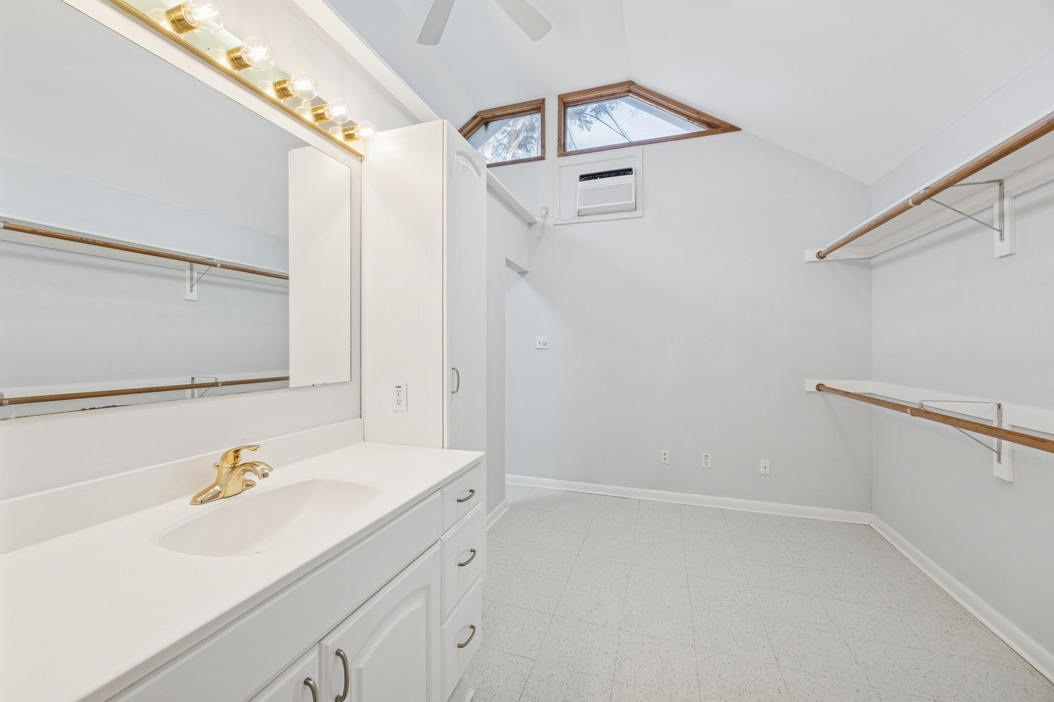 8730 Cedarspur Drive Houston, TX 77055 - Photo 21 of 23 a bathroom with a sink and a mirror
