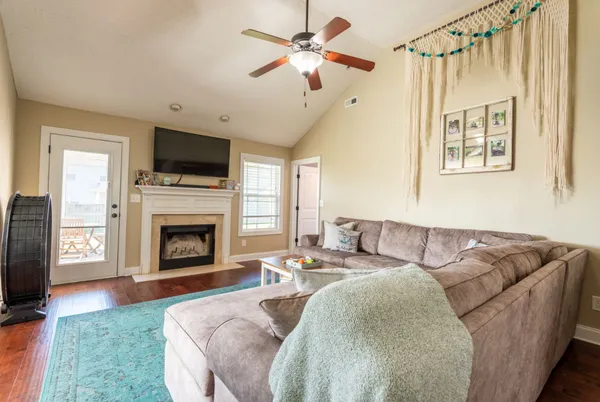 a bed room with a bed and a television