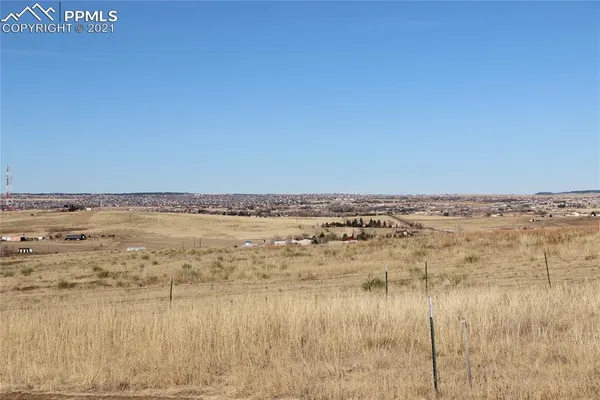 an aerial view of beach and city space