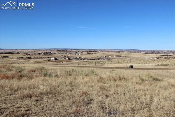 an aerial view of mountain with beach