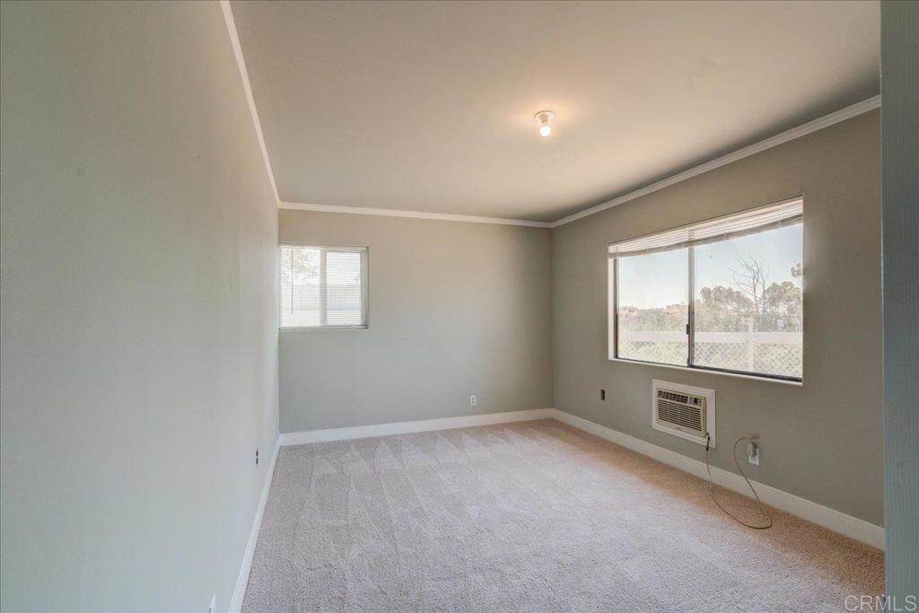 18434 Ramona View Drive Ramona, CA 92065 - Photo 29 of 72 an empty room with windows