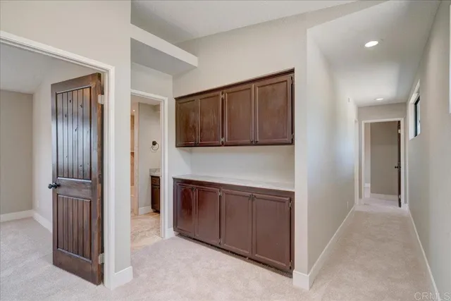 an empty room with a bathroom