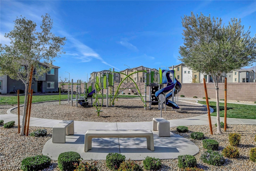 6924 Spicy Merlot Street North Las Vegas, NV 89086 - Photo 56 of 83 A vibrant neighborhood park with modern playground equipment and convenient seating areas.