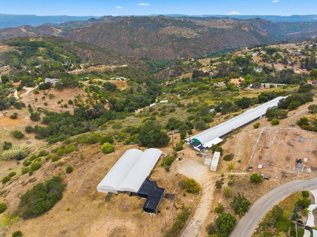 803 Quail Hill Road Fallbrook, CA 92028 - Photo 14 of 36 an aerial view of residential houses with outdoor space