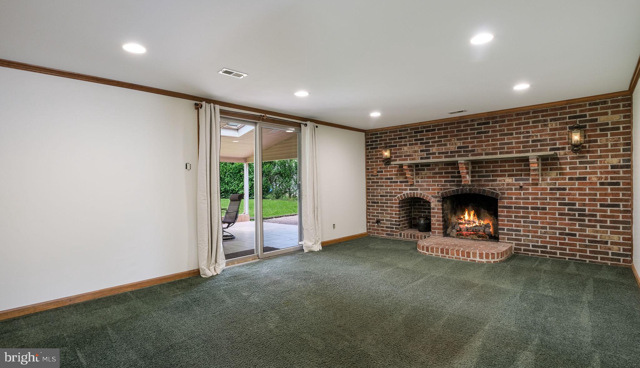1091 Roberts Road Warminster, PA 18974 - Photo 23 of 40 GAS FIREPLACE,
SLIDER TO REAR PATIO