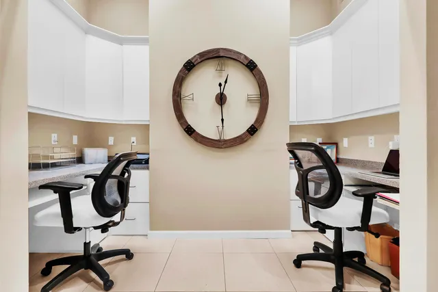 a view of a park with a house in the background