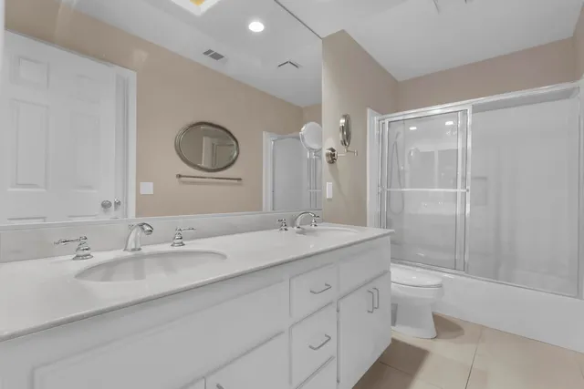 a view of a city with mountains in the background